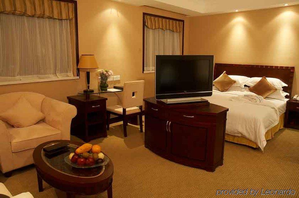 Blue Horizon Royal Parklane International Hotel Shanghai Room photo